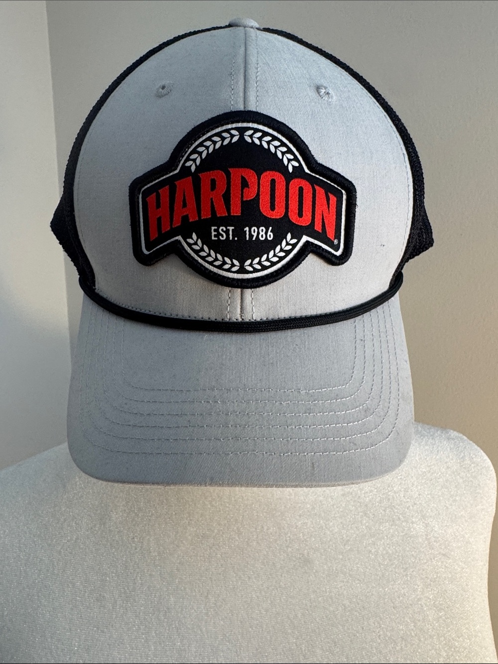 Gray and Black Trucker Hat with Red Logo Patch